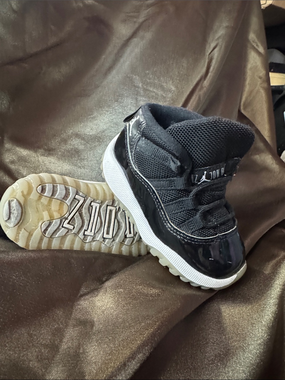 Jordan Kids Black and White High-Top Sneakers